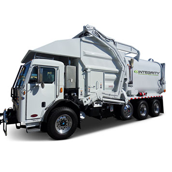 A waste truck performing commercial waste removal